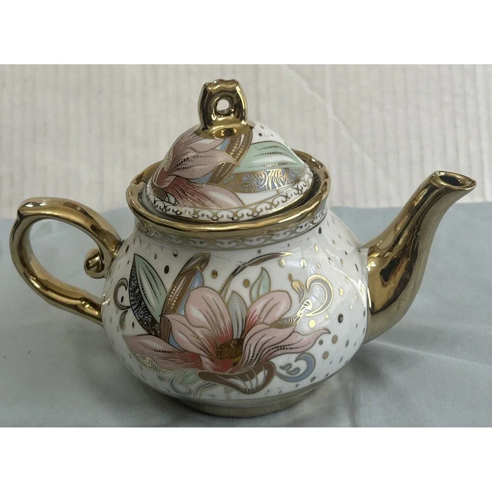 Floral Porcelain Teapot With Gold Tone Trimming
